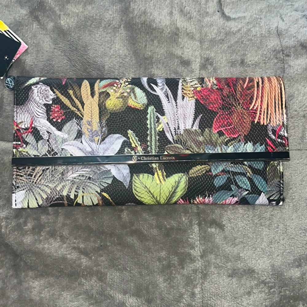 Brand new, never used Zelda clutch